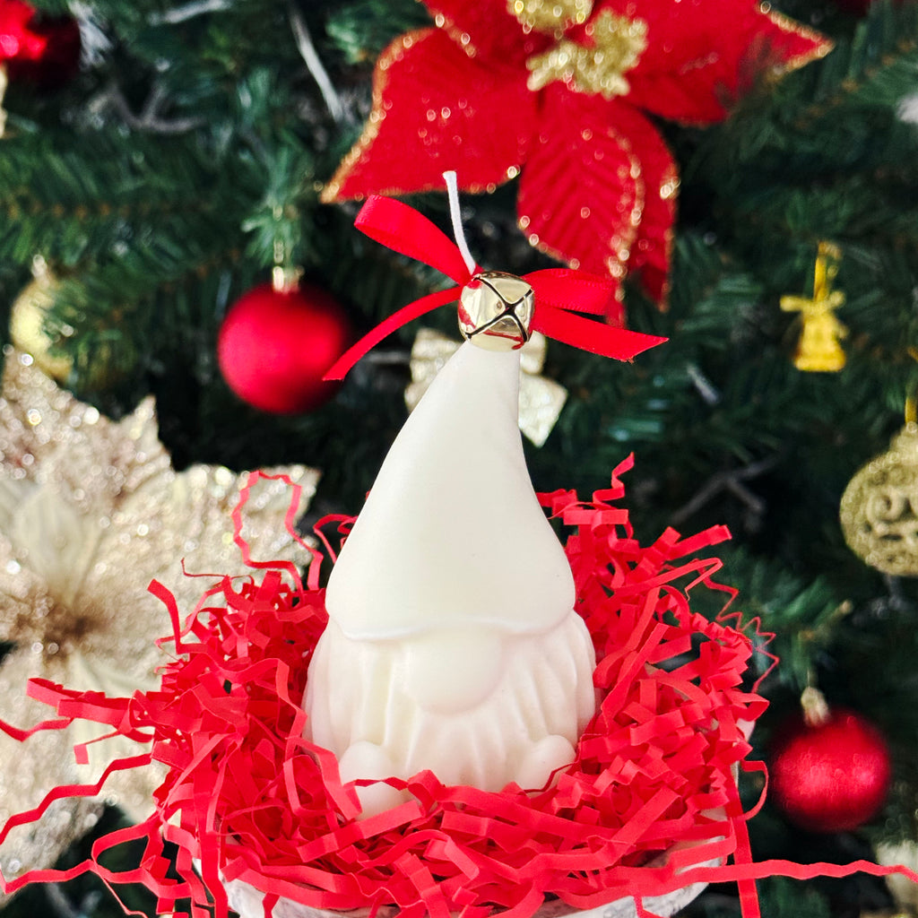 Handmade Gnome Christmas candle made from soy wax with a gingerbread scent.